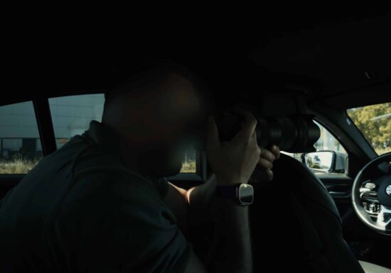 Counter Surveillance | | Infinite Risks International | A creative photographer using a camera inside a vehicle.