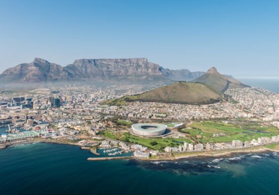 Bodyguard Services in Cape Town. An aerial view of Cape Town, highlighting Table Mountain and the surrounding cityscape.